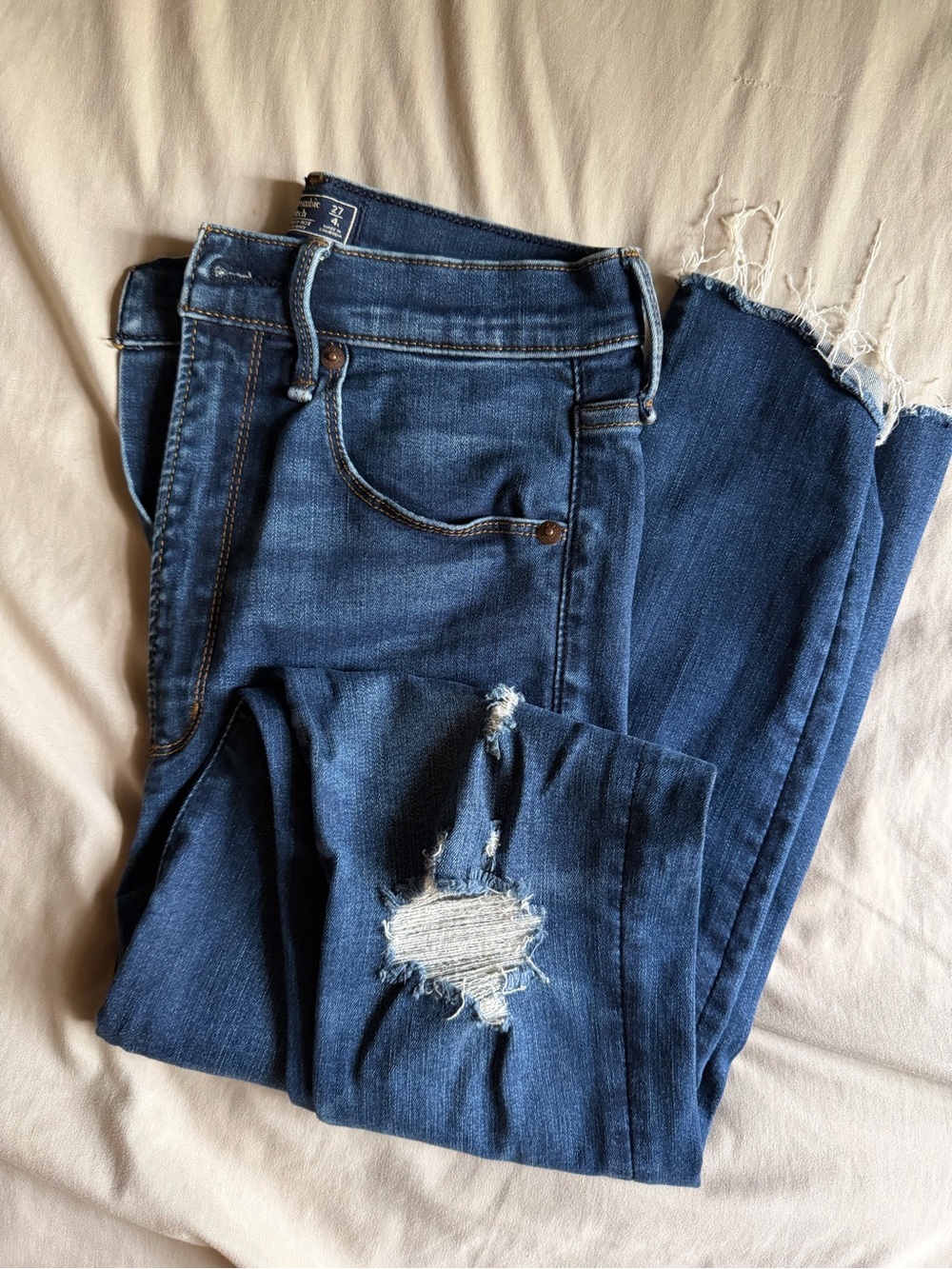 Abercrombie & Fitch Dark Blue Skinny Jeans with Distressed Knee and Frayed Hem